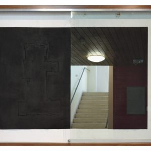 Drawing installation using velvety black charcoal with imprinted burn-like marks indicating the perimeter of The University of Melbourne's Union House contained in one of the wall cabinets that is an architectual feature of the building.
